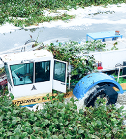 Aquatic weed harvesters and lake cleaning machines for water restoration and pollution control