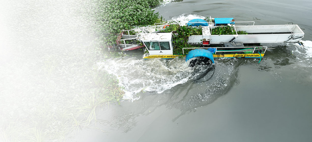 Weed harvesting machine designed for efficient removal of aquatic weeds, floating trash improving water quality and supporting ecosystem restoration.