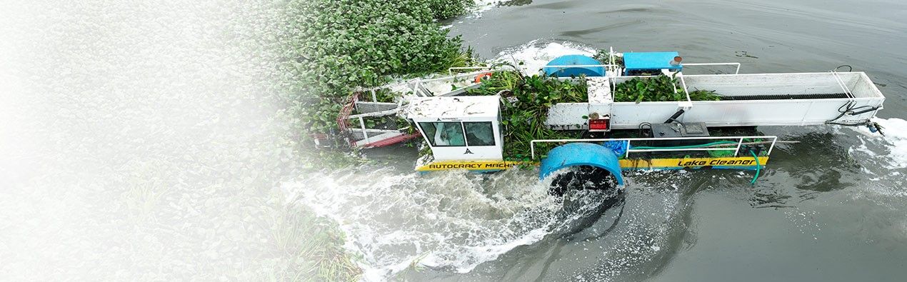 Weed harvesting machine designed for efficient removal of aquatic weeds, floating trash improving water quality and supporting ecosystem restoration.