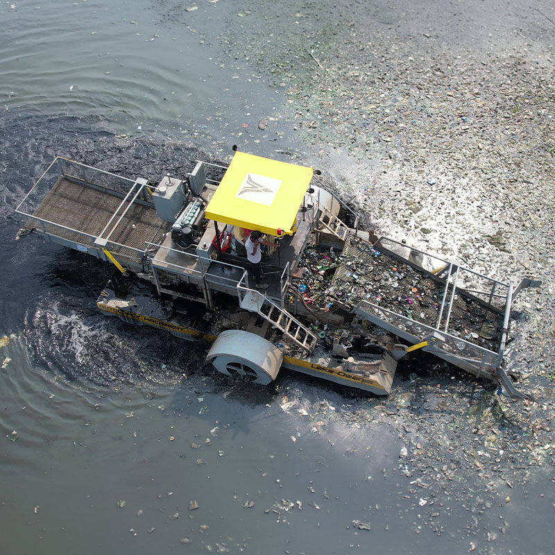 weed harvesters and lake cleaning machines for water restoration and pollution control